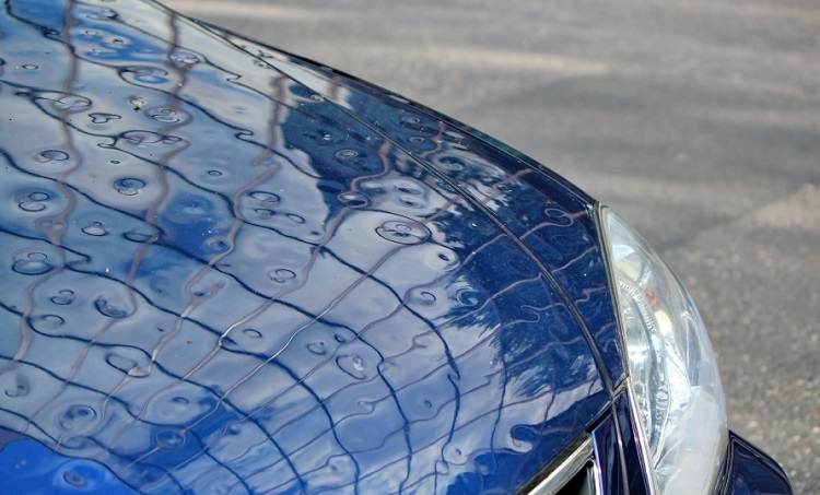 Paintless dent removal hail dent repair
